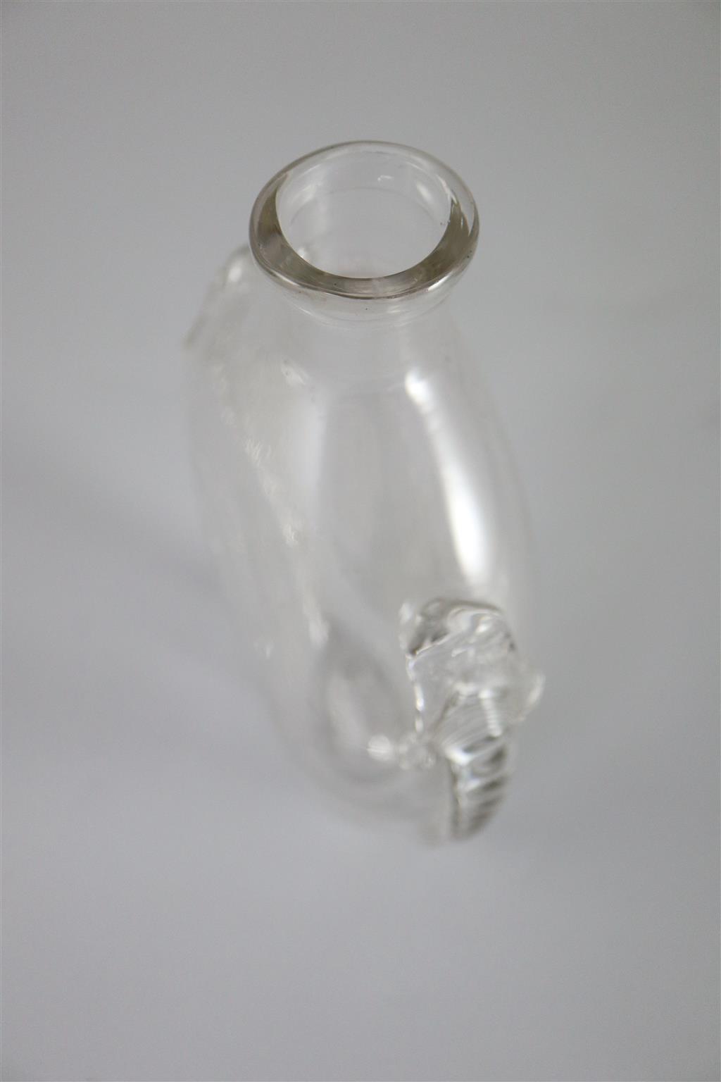 A Georgian glass flattened ovoid flask, 18th century, 18.5cm long